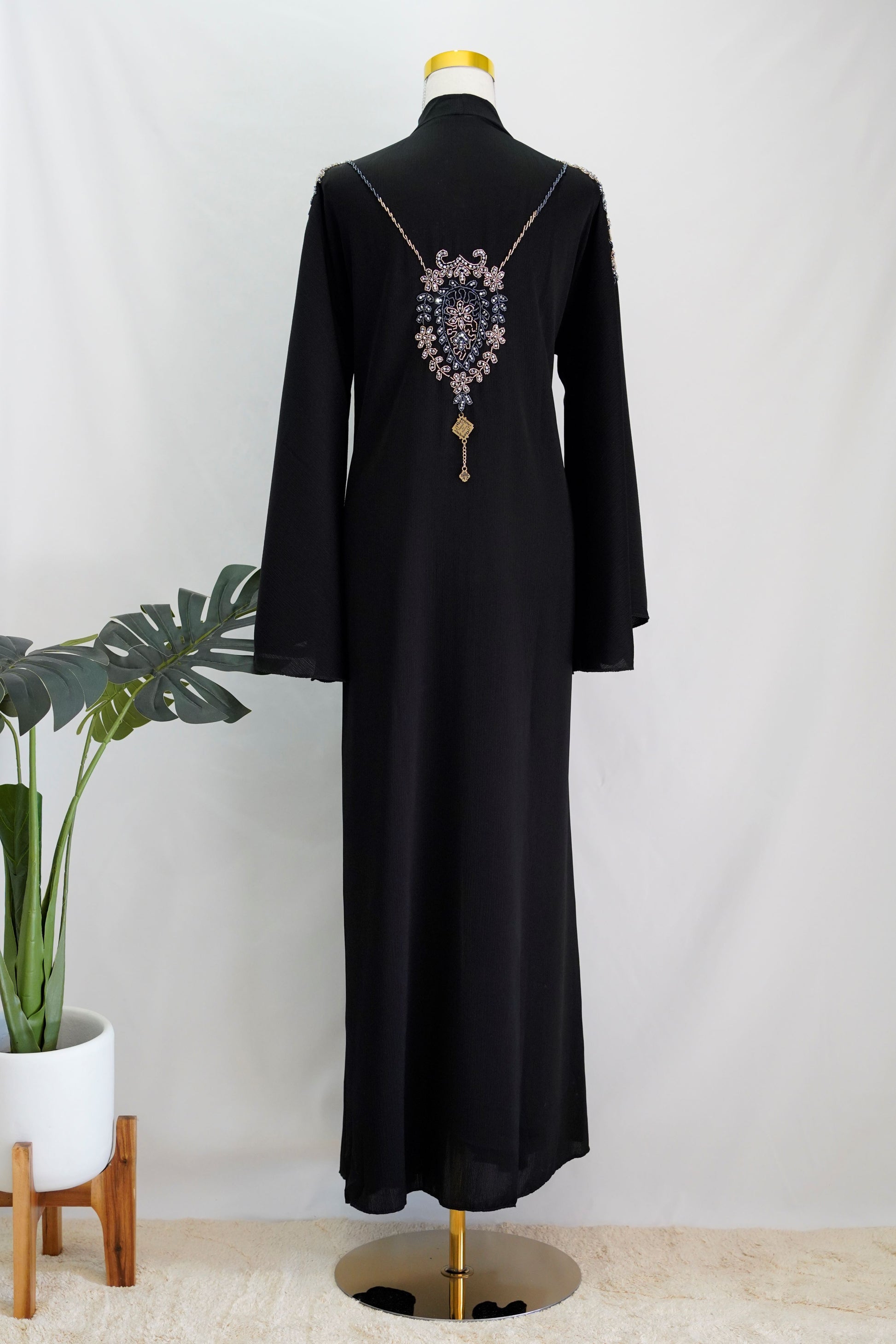 Aleena Abaya, back side, full length