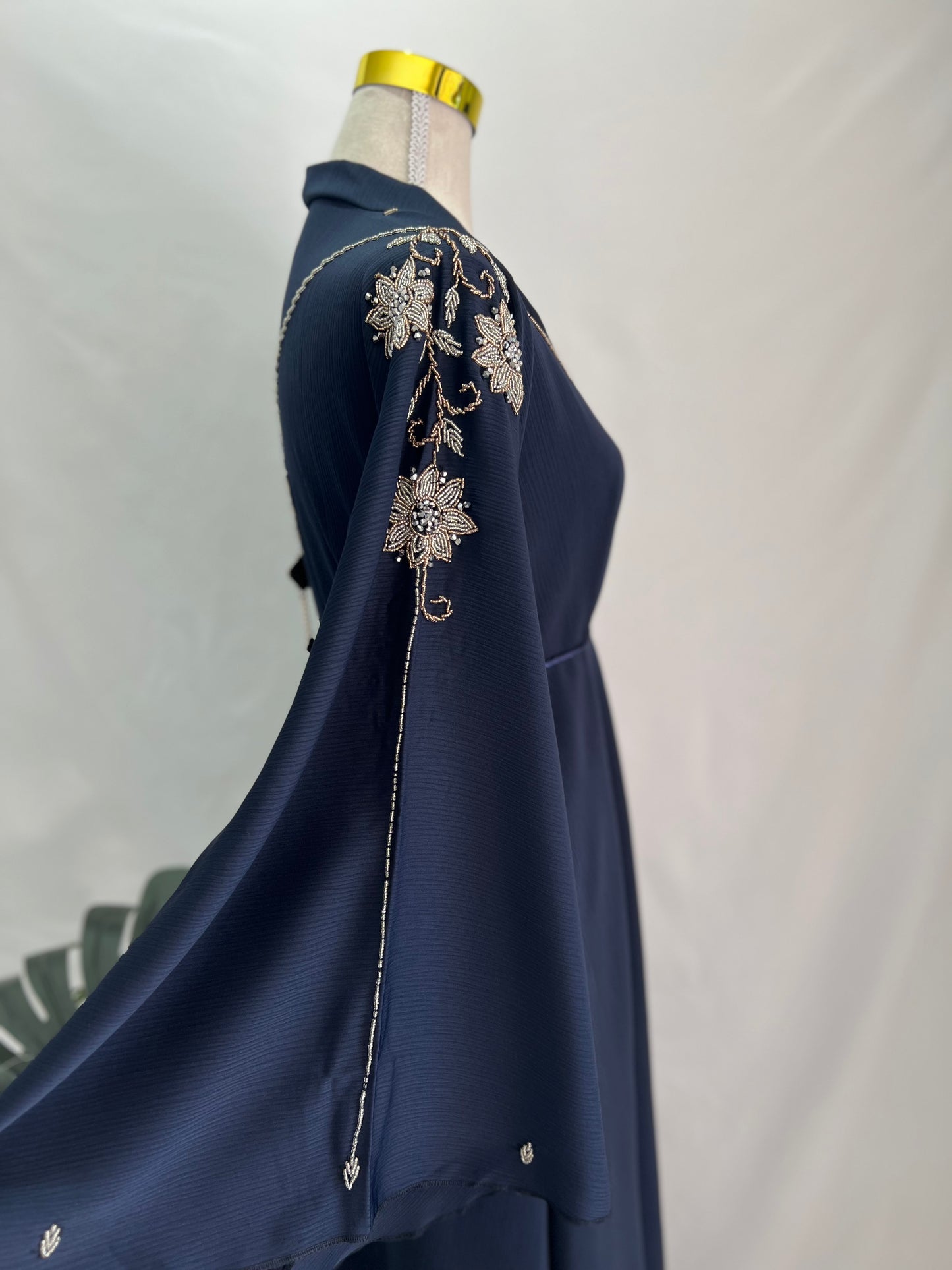 Lana Abaya, side view, bell sleeve, close up, upper body only