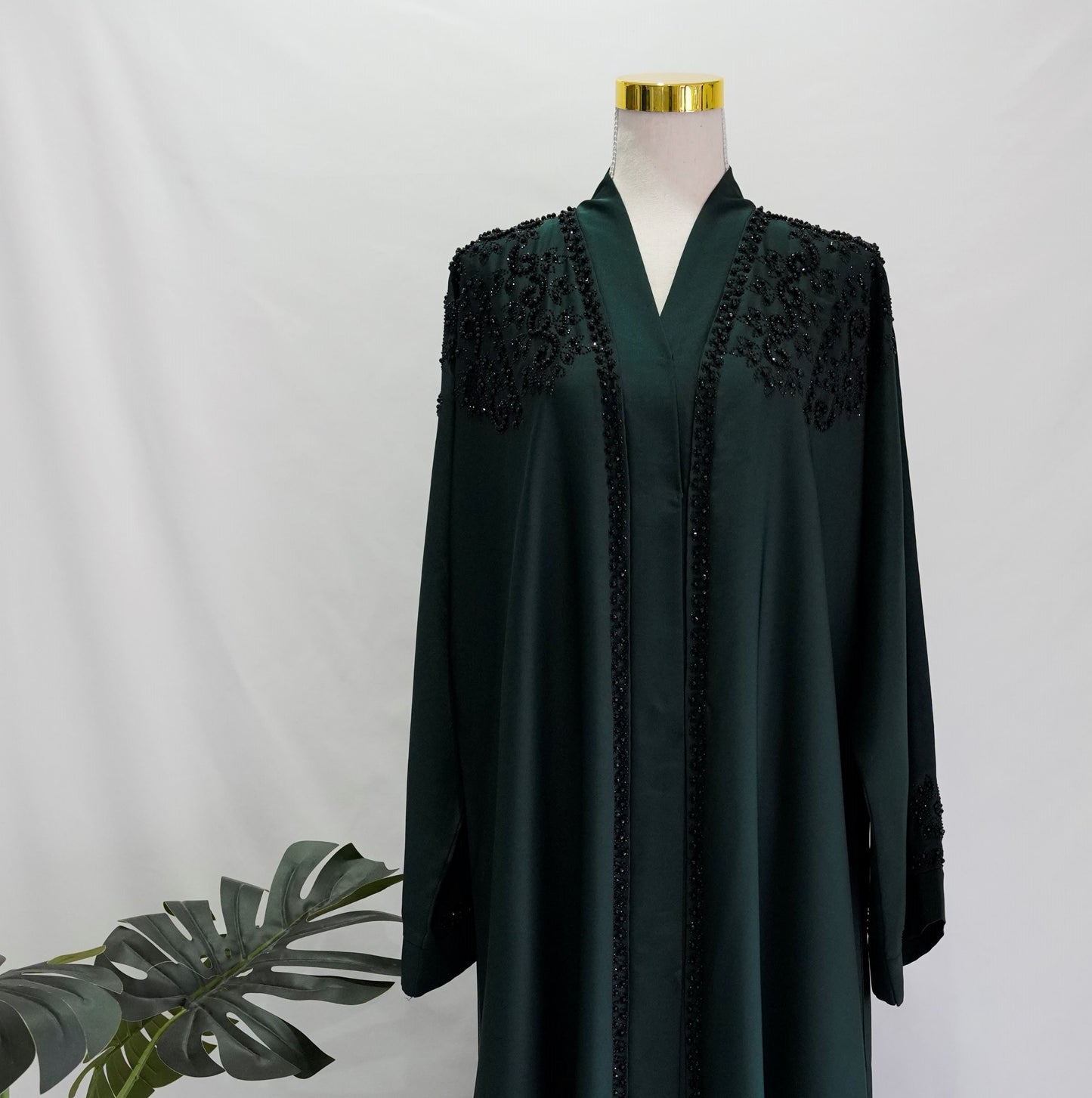 Maalika Abaya, front view, close up, upper body only